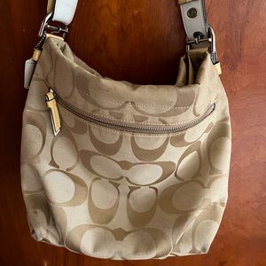 Coach shoulder bag.  White & yellow patent leather trim.  Very good used.